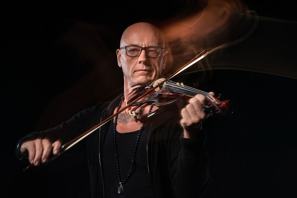 Sage Rader playing the violin